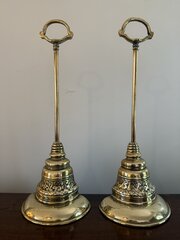 A Pair Of Antique Brass Door Porters / Stops