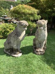 Pair Of Weathered Reconstituted Sitting Jaguars
