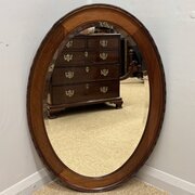 Oval Mahogany Framed Mirror With Bevelled Glass