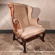 A Queen Anne Period Walnut Wing Chair.