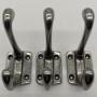 Set of three Edwardian steel coat hooks