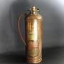 Vintage British copper fire extinguisher.