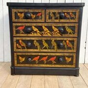 Birds On A Chest Of Drawers