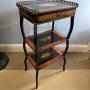 A French Ebonized Walnut Frame Whatnot
