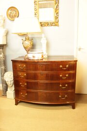 A Georgian Mahogany Bow-Front Chest Of Drawers 