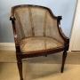 A Mahogany Caned Bergère Armchair
