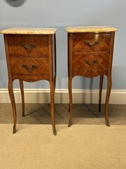 A Pair of French Walnut Bedside Tables