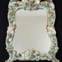 Mirror in polychrome Capodimonte porcelain. 20th C