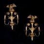 Pair of gilded and carved wooden wall sconces.XX c