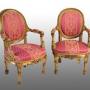 Pair of gilded wooden armchairs. France 19th C.