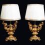Pair of gilded wooden lamps. Italy, 18th century.