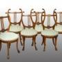 Set of six Empire walnut chairs. Italy 19th C.