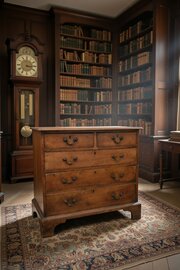 A George II Fruitwood/walnut Chest Of Drawers.