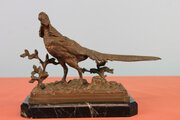 Bronze Of A Golden Pheasant In Landscape