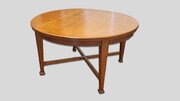 A Large Arts & Crafts Oak Circular Dining Table