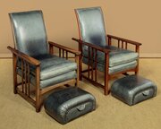 Pair Of Reclining Leather Armchairs & Footstools