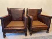 Pair Of Antique Original Hide Cottage Arm Chairs. 