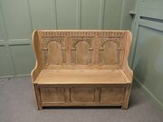 A 20th Century High Back Oak Box Settle