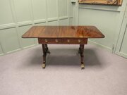 A Fine Regency Lyre Ended Sofa Table