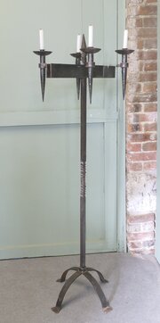 A Large Iron Candle Stick Or Torchère