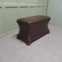 A Large Regency Waisted Leather Ottoman  