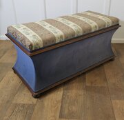 A Large Regency Waisted Upholstered Ottoman