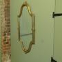 A Long Shaped Oval Brass Wall Mirror