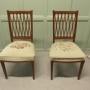 A Pair of Arts and Crafts Walnut Hall Chairs