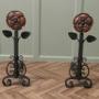 A Pair of Large Arts and Crafts Copper Andirons 