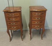 A Pair Of Tall French Four Drawer Ormolu Side Lockers