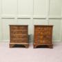 A Pair of Walnut Bedside Chest of Drawers