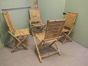 A Set Of 4 Of Bamboo Planation Chairs  