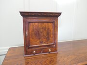 A Small Lockable Burr Walnut Cabinet