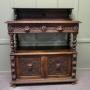A Superbly Carved Green Man Oak Side Board, Buffet