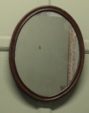 A  Victorian Oval Wall Mirror With Sparkle