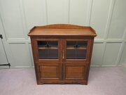 Arts And Crafts Oak Stained Glass Bookcase.