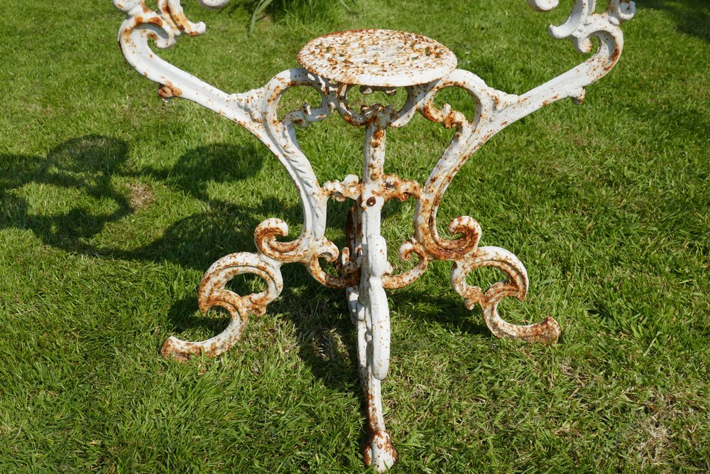 Antiques Atlas - Weathered Cast Iron 6 Branch Plant Stand.