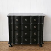 French Ebonised Serpentine Commode.