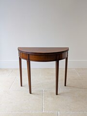 George III Mahogany Demi-Lune Fold-over Tea Table