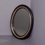 19th Century ebonized and gilded oval hall mirror
