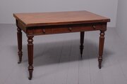 A Gillows Of Lancaster Pull-Out Library Table
