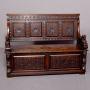 A Large Carved Oak Hall Bench