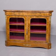 Victorian figured walnut twodoor glazed cabinet