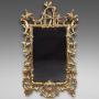 A Carved Gilt Wood Wall Mirror