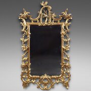 A Carved Gilt Wood Wall Mirror
