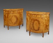 A Fine Pair Of Satinwood Demi Lune Commodes