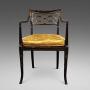 A Fine Regency Ebonised & Gilt Decorated Arm Chair