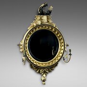 A Rare Regency Convex Gilt Wood Mirror