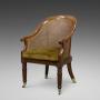 A Regency mahogany bergere chair