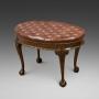 A Large Carved Mahogany Oval Stool